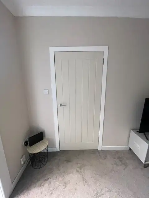 Cottage style internal door fitted in a living room in Ayr