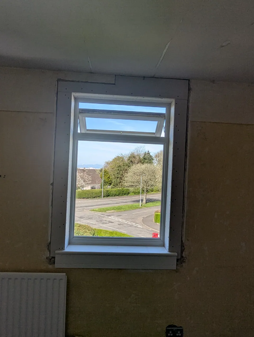 New window sill and facings fitted around a window opening in Dundonald