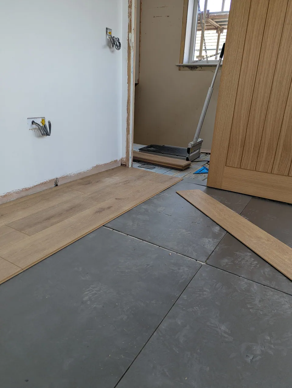 Newly fitted laminate flooring installed by McKee Joinery