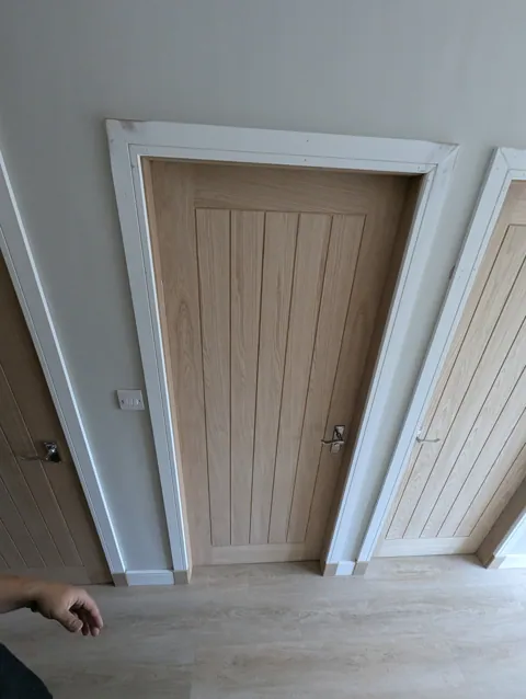 Oak veneered cottage style door with chrome scroll handle and new facings in Irvine