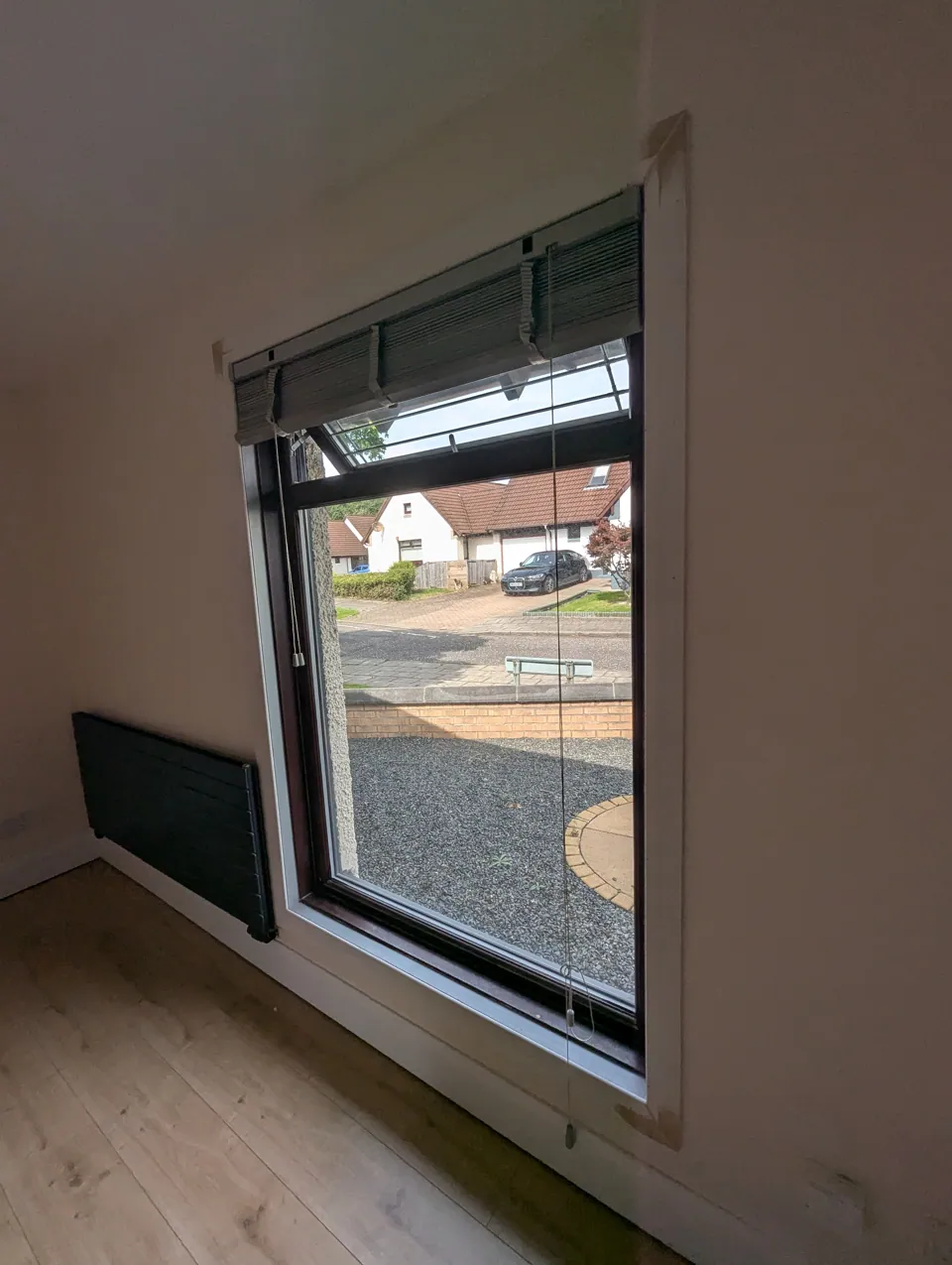 Window in an Irvine home finished with a chamfered facing running the full way around the opening