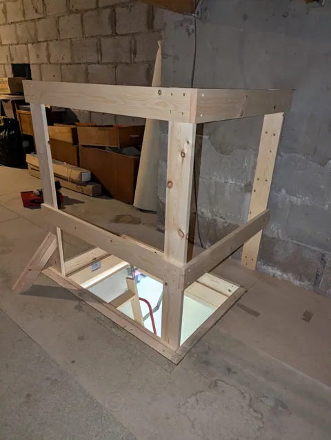 Purpose-built timber safety guard rail constructed around the loft opening inside the loft