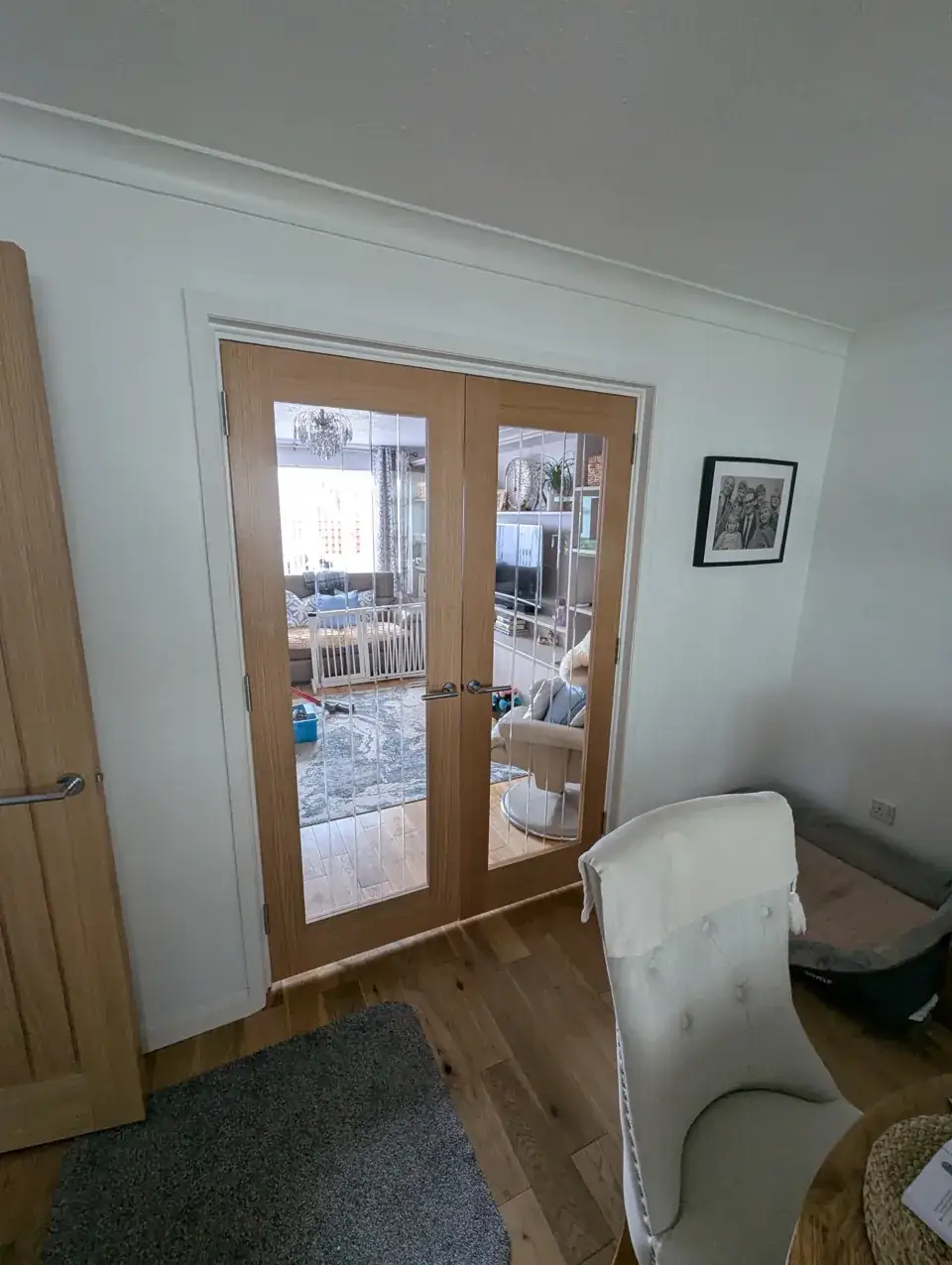 Glazed French doors to the living room